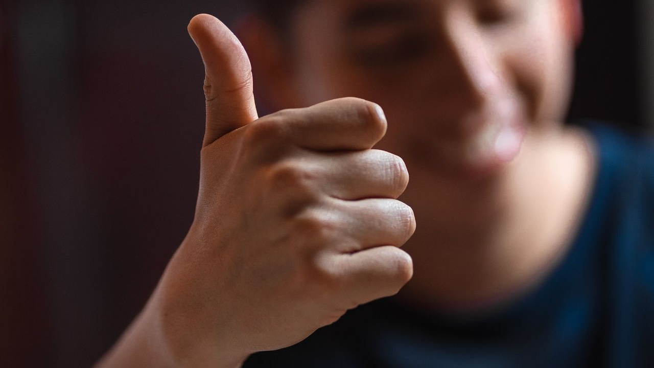 man wearing blue crew-neck shirt
